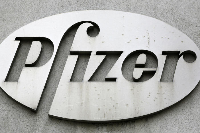 The Pfizer logo is displayed on the exterior of a former Pfizer factory, on May 4, 2014, in the Brooklyn borough of New York.