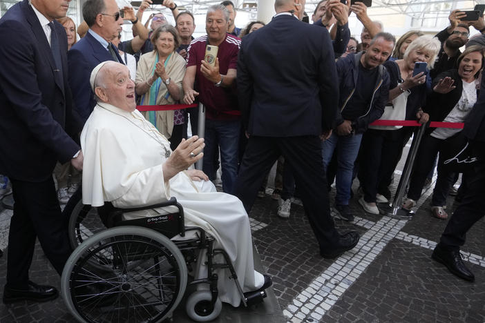 Pope Francis leaves the Agostino Gemelli University Polyclinic in Rome, on Friday, nine days after undergoing abdominal surgery.