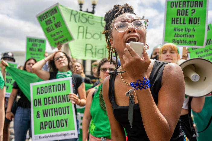 Abortion rights supporters demonstrate outside the U.S. Supreme Court on June 24, 2022, in response to its decision in <em>Dobbs v. Jackson Women's Health Organization</em>.