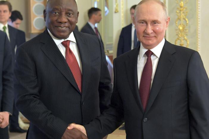 In this handout photo provided by Photo host Agency RIA Novosti, Russian President Vladimir Putin, right, and South African President Cyril Ramaphosa pose for a photo during a meeting with a delegation of African leaders and senior officials in St. Petersburg, Russia, Saturday, June 17, 2023.