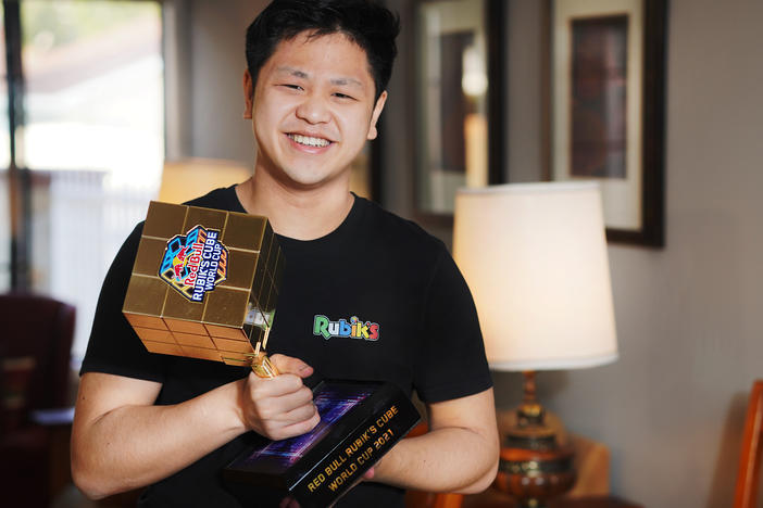Max Park, pictured after winning a December 2021 competition, recently set a world record for solving a 3x3x3 Rubik's cube in 3.13 seconds.