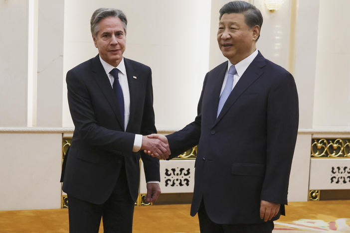 U.S. Secretary of State Antony Blinken shakes hands with Chinese President Xi Jinping in the Great Hall of the People in Beijing on Monday.