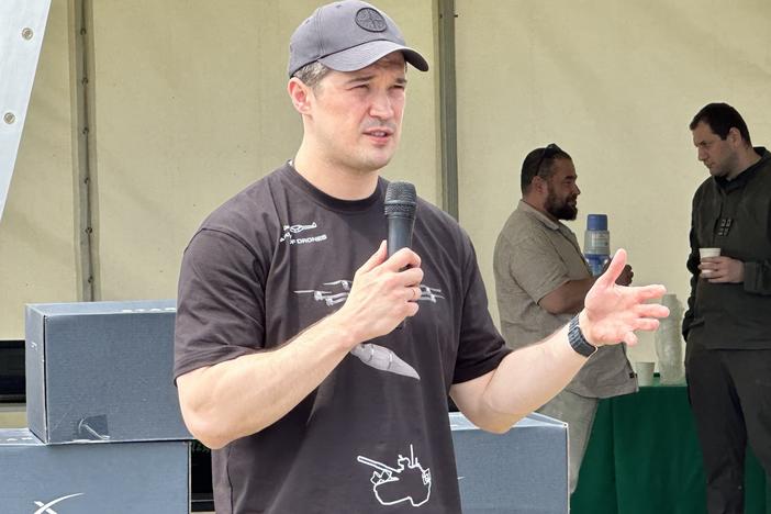 Ukraine's Deputy Prime Minister Mykhailo Federov speaks to drone makers and drone pilot trainers at an event south of Kyiv on June 15. Federov leads the Army of Drones project that has allowed Ukraine to make wide use of drones, for reconnaissance and attacks, offsetting the huge advantage Russia has with its traditional air force.