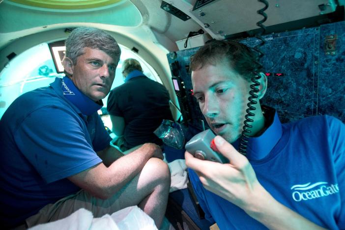 Submersible pilot Randy Holt and Stockton Rush, CEO and co-founder of OceanGate, dive in the company's Antipodes submersible off the Florida coast in 2013. Rescuers are racing to find a missing OceanGate submersible before the oxygen supply runs out for five people, including Rush, who were on a mission to document the wreckage of the Titanic.