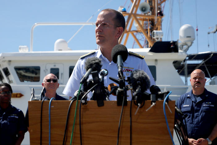 Rear Adm. John Mauger, the U.S. Coast Guard District commander, speaks during a news conference in Boston on Thursday about the search for the missing OceanGate submersible Titan.