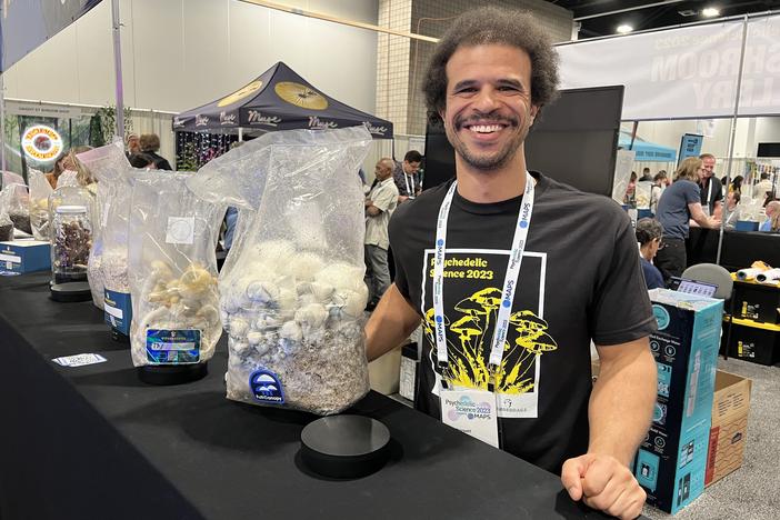 Zack Dorsett, the operations manager of Wonderbags, a company that sells mushroom starter kits, at his company's booth at the "Psychedelic Science 2023" conference in Denver on Wednesday, June 21, 2023