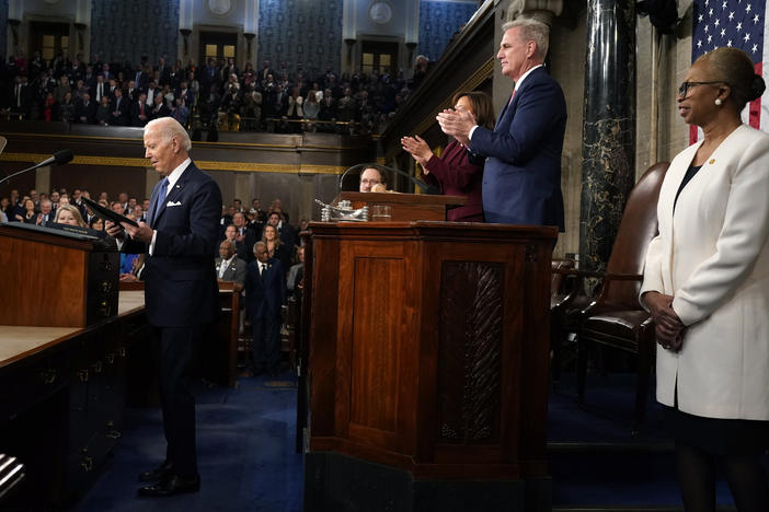 President Biden prepares to deliver the State of the Union address to a joint session of Congress at the Capitol on Feb. 7 as Vice President Kamala Harris, House Speaker Kevin McCarthy of Calif., and Clerk of the House of the Representatives Cheryl Johnson watch.