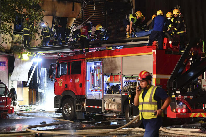 In this photo released by Xinhua News Agency, firefighters work at the site of an explosion at a restaurant in Yinchuan, northwest China's Ningxia Hui Autonomous Region in the early hours of Wednesday, June 21, 2023.