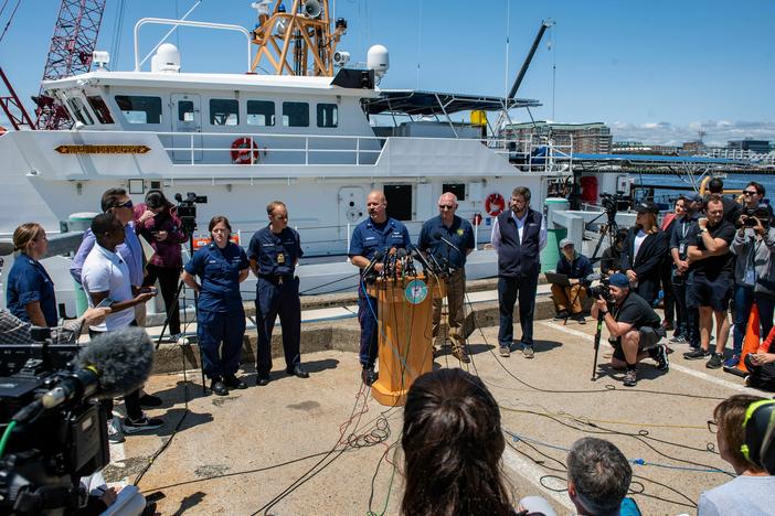 U.S. Coast Guard Capt. Jamie Frederick speaks to reporters about the search for the Titan submersible on Wednesday in Boston, Mass.