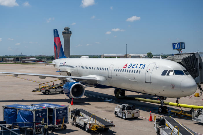 A Delta Air Lines plane is seen waiting in April at the Austin-Bergstrom International airport in Austin, Texas.