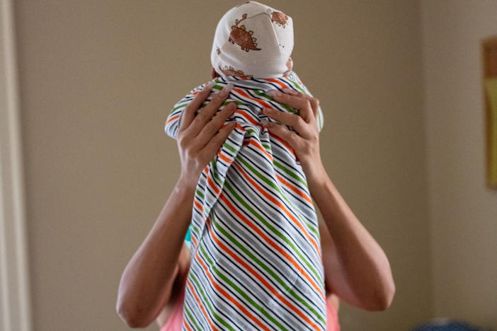 L holds her baby at Casa Mía in San Antonio, which provides housing and support for pregnant people and new mothers struggling with addiction. Her son, who's now 2 months old, was born healthy despite L's history of substance abuse. NPR is not using L's full name out of concern for her safety; L says she was in an abusive relationship when she became pregnant.