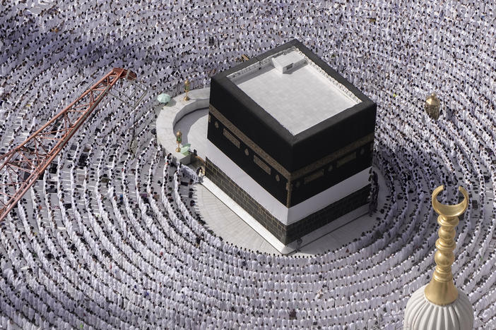 Muslim pilgrims pray around the Kaaba, the cubic building at the Grand Mosque, during the annual Hajj pilgrimage in Mecca, Saudi Arabia, Sunday.