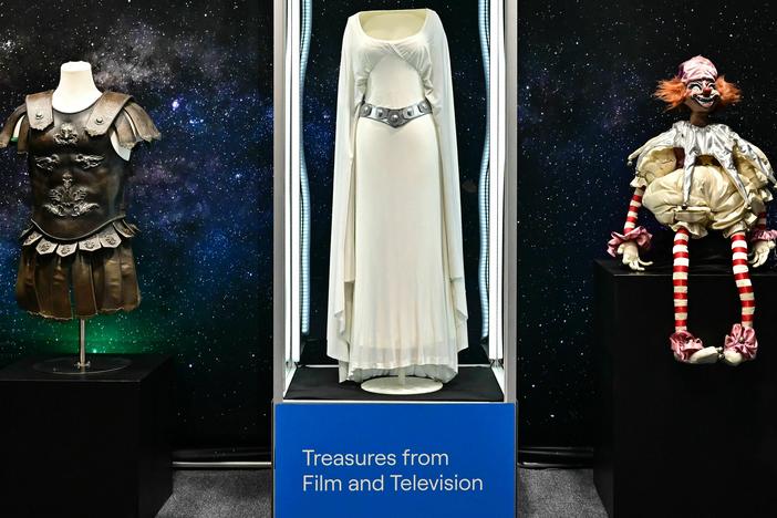 A dress worn by actress Carrie Fisher in the 1977 film <em>Star Wars</em> is one of 1,400 items up for sale at a live auction of film and TV memorabilia in Los Angeles this week.