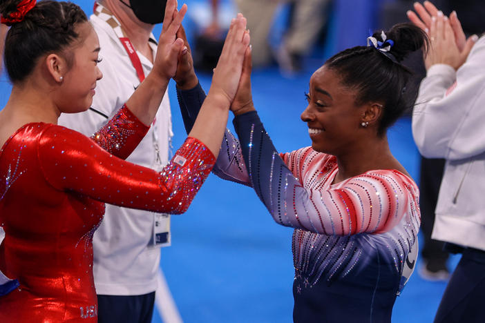 Sunisa Lee and Simone Biles of Team USA during the Women's Balance Beam Final at the Tokyo 2020 Olympic Games in August 2021.