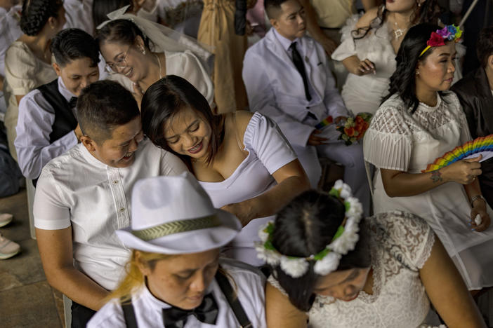 Filipino same-sex couples tie the knot in a mass wedding ceremony on June 25, 2023, in Quezon City in metro Manila, Philippines. In a symbolic act against the lack of comprehensive legislation for gender minorities in the Philippines, 29 same-sex couples tied the knot in a mass wedding ceremony organized by the LGBTS (Let God Be Thy Savior) Christian Church Inc.