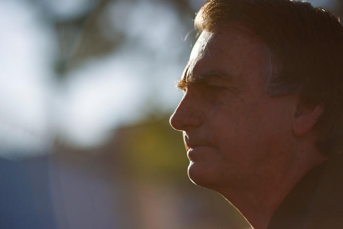 Brazil's former President Jair Bolsonaro at Brasilia International Airport on Thursday.