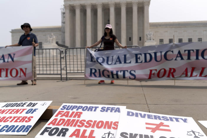 People protest outside the Supreme Court in Washington, D.C., on Thursday. The Supreme Court on Thursday struck down affirmative action in college admissions, declaring race cannot be a factor and forcing institutions of higher education to look for new ways to achieve diverse student bodies.