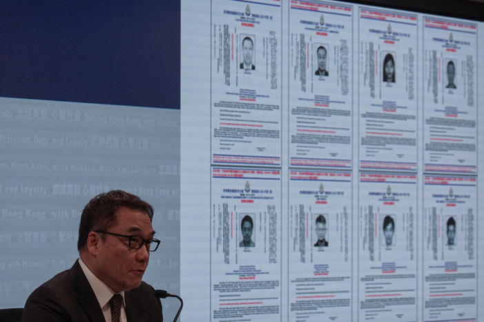 Steve Li Kwai-wah, Hong Kong's national security department superintendent, speaks during a press conference to issue arrest warrants for eight activists, in Hong Kong on Monday.