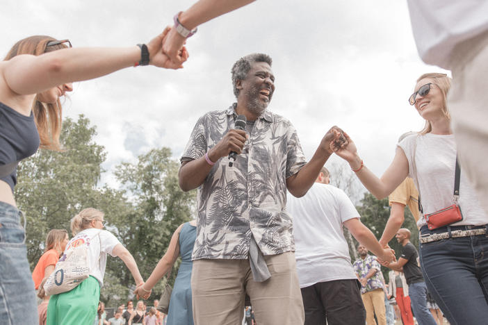 Edgard Gouveia at the PxP Festival in Berlin, where he organized a circle dance. He's a believer in the power of games and is currently developing a global game "to get communities to come together and use hands-on actions to restore the environment."