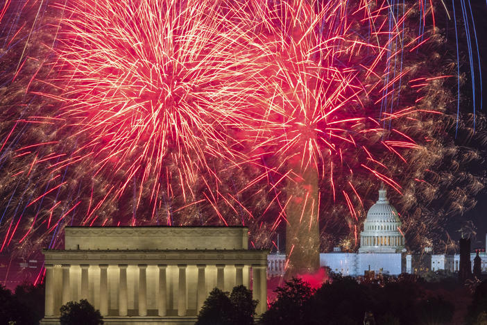 Fireworks burst on the National Mall above the Lincoln Memorial, Washington Monument and U.S. Capitol on July 4, 2022.