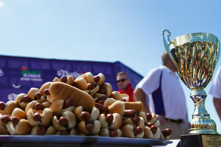 The celebratory hot dogs await their impending doom.