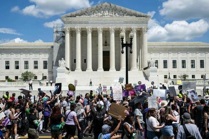 Demonstrators rally to mark the first anniversary of the US Supreme Court ruling in the <em>Dobbs v Women's Health Organization</em> case in Washington, DC on June 24, 2023.
