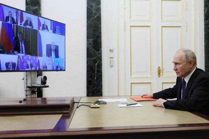 Russian President Vladimir Putin chairs a Security Council meeting via a video link at the Kremlin in Moscow on Friday.