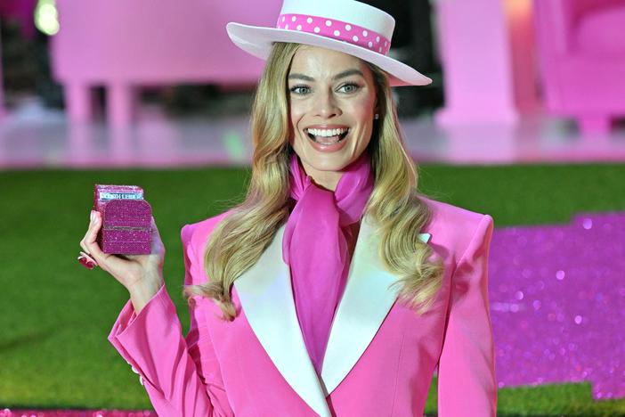 Margot Robbie poses on the pink carpet at a <em>Barbie</em> event in Seoul on July 2.