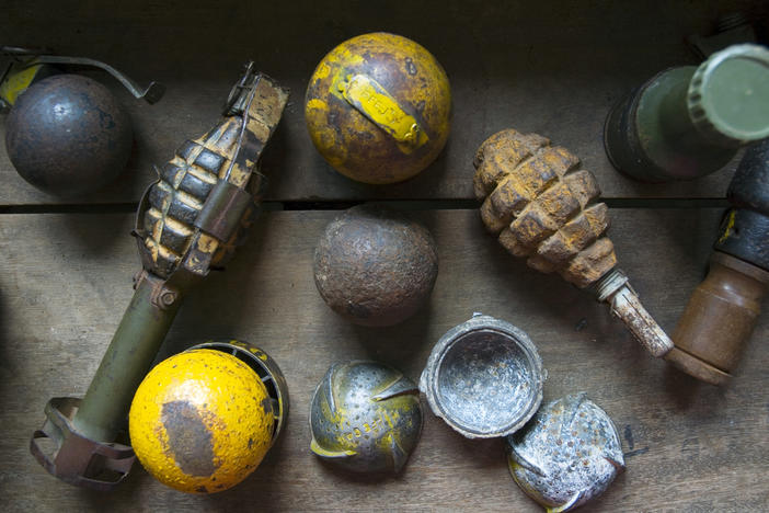 View of a collection of defused cluster bombs and grenades used by an international bomb disposal group for training in Savannakhet, Laos, on May 2, 2006.