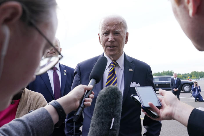 President Biden speaks to reporters before boarding Air Force One in Vilnius, Lithuania. Biden was attending the NATO summit and was heading to Helsinki, Finland.