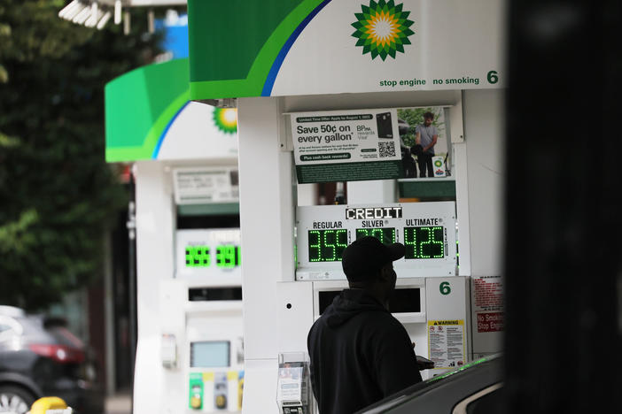 A person pumps gas at a BP gas station in Brooklyn, N.Y., on June 12. Annual inflation eased to 3% in June, the lowest in over two years, and there's hope that it could go lower.