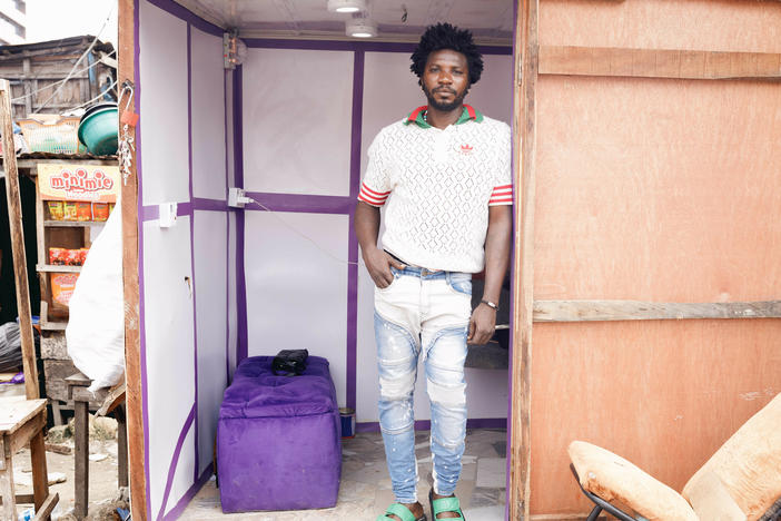Beautician Murphy Oyewole at his salon at Balogun Market, Lagos Island, Lagos.
