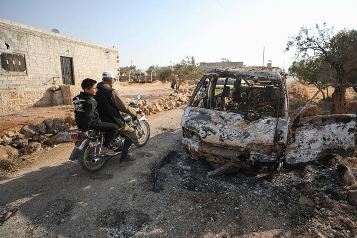 This photo, taken Oct. 27, 2019, the day after the raid on ISIS leader Abu Bakr al-Baghdadi's compound in Syria, shows the van that was targeted by U.S. airstrikes. Photos of the van prompted questions about who was targeted.