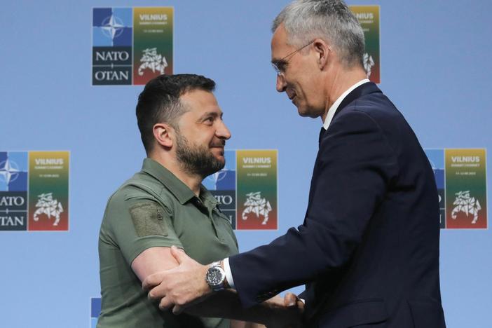 NATO Secretary-General Jens Stoltenberg, right, shakes hands with Ukrainian President Volodymyr Zelenskyy on Wednesday after a joint press conference at the NATO summit in Vilnius, Lithuania.