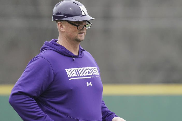 Northwestern head coach Jim Foster looks on from the third base box during an NCAA baseball game against USC Upstate on Sunday, Feb. 26, 2023, in Spartanburg, S.C.