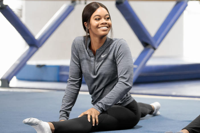 Olympic gold medalist Gabby Douglas was 16 when she turned in a historic performance in London. Now she wants to return, eyeing the 2024 Paris Olympics. Douglas is seen here in 2020.