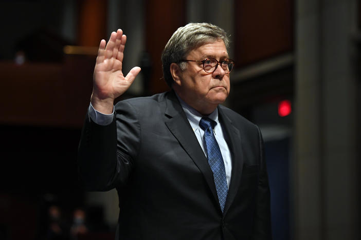 Attorney General William Barr takes the oath before he appears before the House Oversight Committee on July 28, 2020 on Capitol Hill in Washington D.C.