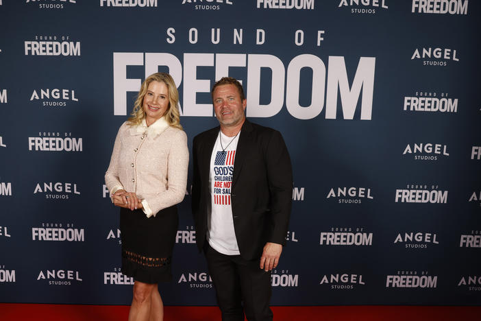 Mira Sorvino and Tim Ballard attend the premiere of <em>Sound of Freedom</em> on June 28 in Vineyard, Utah. Ballard is a former federal agent who went on to found the controversial anti-human trafficking organization depicted in the film.