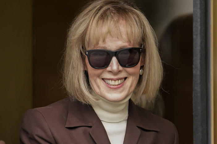 E. Jean Carroll walks out of federal court in Manhattan, May 9, 2023, in New York. A federal judge has denied former President Donald Trump's request for a new trial in the E. Jean Carroll defamation case.