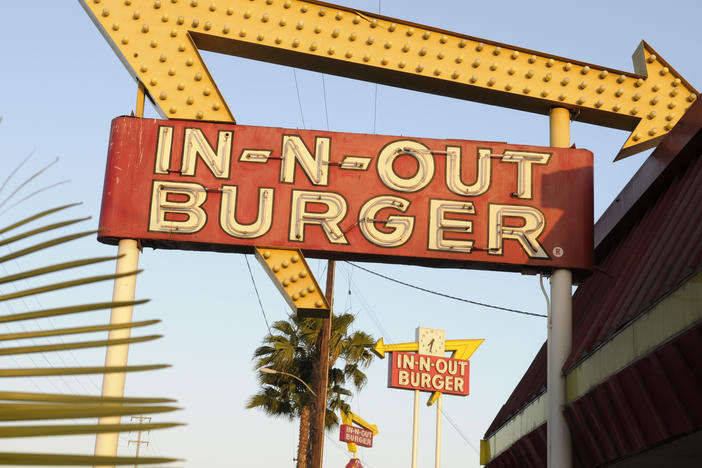 In-N-Out is barring employees in five states from wearing masks unless they have a doctor's note, according to internal company emails leaked on social media last week. An In-N-Out Burger signs is seen on June 8, 2010, in Baldwin Park, Calif.