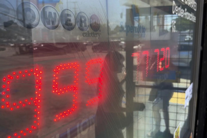 People buy Powerball tickets at Joe's Service Center, a Mobil gas station that previously sold the $2.04 billion-winning Powerball ticket at Woodbury Road and Fair Oaks Avenue in Altadena, Calif., Wednesday, July 19, 2023.
