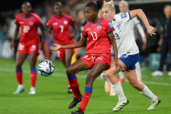 Betina Petit-Frere of Haiti controls the ball against Alessia Russo of England during the teams' opening game at the Women's World Cup in Brisbane, Australia on July 22, 2023. Haiti is one of eight newcomers at the tournament this year.