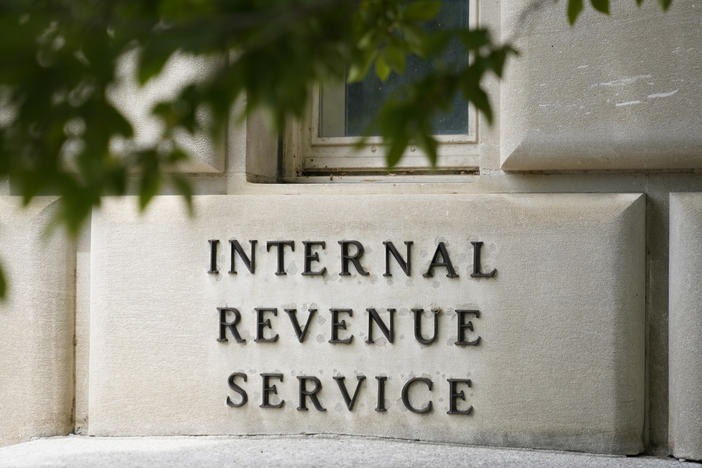 A sign outside the Internal Revenue Service building in Washington, on May 4, 2021. Effective immediately, the Internal Revenue Service will end its decades-old policy of making unannounced home and business visits — in a nod to worker safety and combatting scammers who pose as IRS agents.