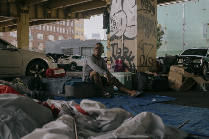 Jose Alvarado, an asylum seeker who arrived in New York City from Venezuela, sits at his camp. Alvarado says he was expelled from the Clinton Hill shelter due to an incident in the facility bathrooms. Brooklyn, New York, U.S., Wednesday, July 19, 2023.