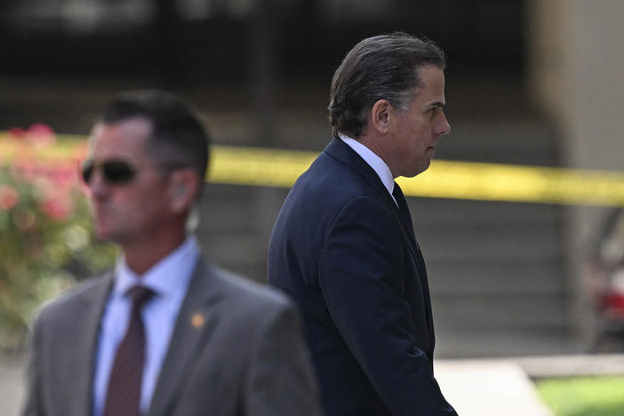 Hunter Biden arrives in J. Caleb Boggs Federal Building to appear in court to plead guilty to two federal misdemeanors for not paying taxes on time, and possessing a gun as a drug user, in Delaware on July 26.