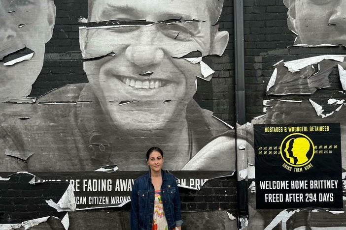 <em>"It's not emotionally easy to come by here anymore," Neda Sharghi said of this alley in Washington, D.C. Her brother Emad Shargi, depicted above, remains in Iran's Evin prison.</em>