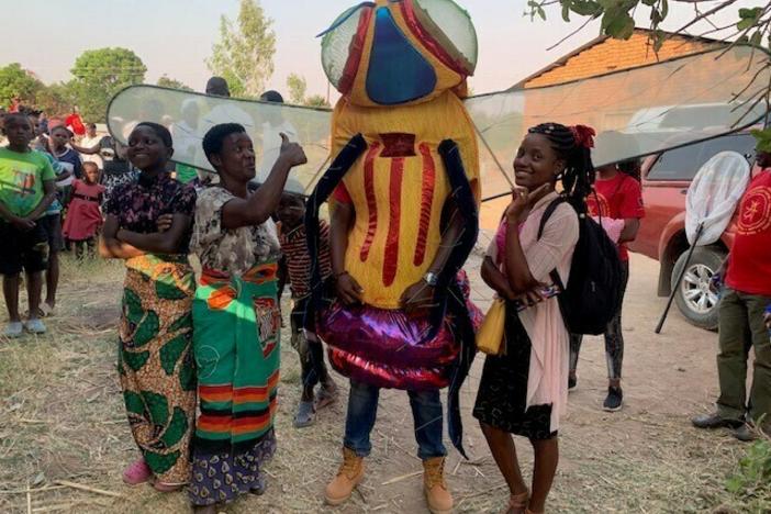 Don't worry, this six-foot-tall tsetse fly didn't bite anyone. He was part of a performance to teach Malawians about preventing sleeping sickness.