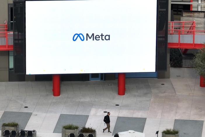 A large video monitor on the campus of Meta, Facebook's parent company, in Menlo Park, Calif. in February. New research about Facebook shows its impact on political polarization.