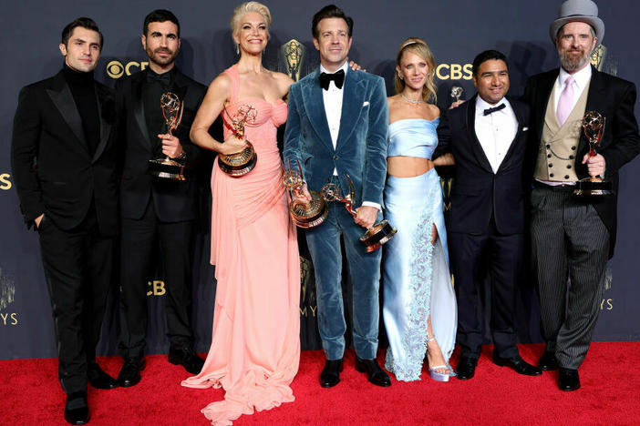The cast of <em>Ted Lasso</em> pose during the 73rd Emmy Awards in 2021.