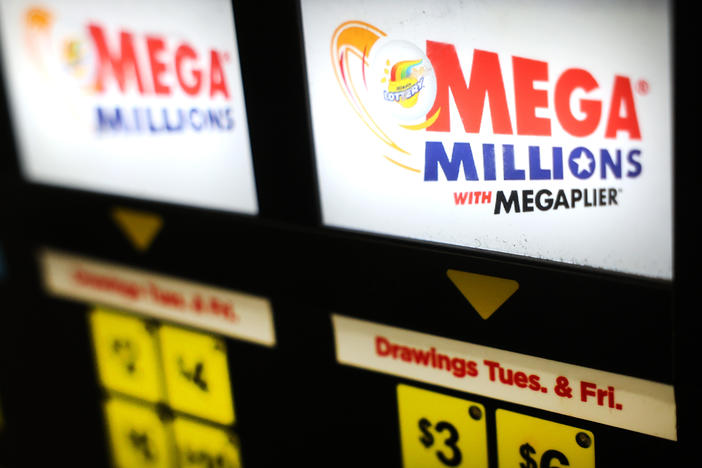 A lottery ticket vending machine offers Mega Millions tickets for sale on Jan. 9 in Chicago. The Mega Millions jackpot has grown to a whopping $1.05 billion.